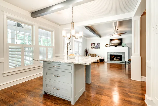 Open-concept living room and kitchen after an interior remodel