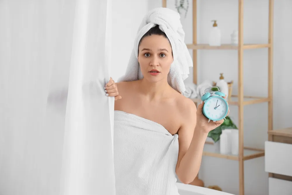 Woman Timing Her Bathroom Remodel in Fort Worth